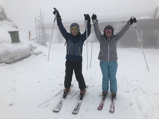 having fun during ski lessons at the top of the Postavaru Massif